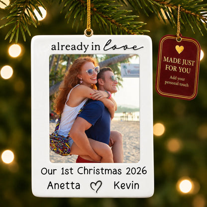 Couple photo frame christmas ornament hanging on a lit Christmas tree with a Made Just For You gift tag