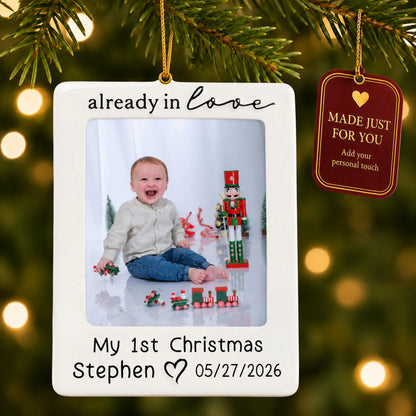 Already in love baby photo frame christmas ornament hanging on a lit Christmas tree with a Made Just For You gift tag