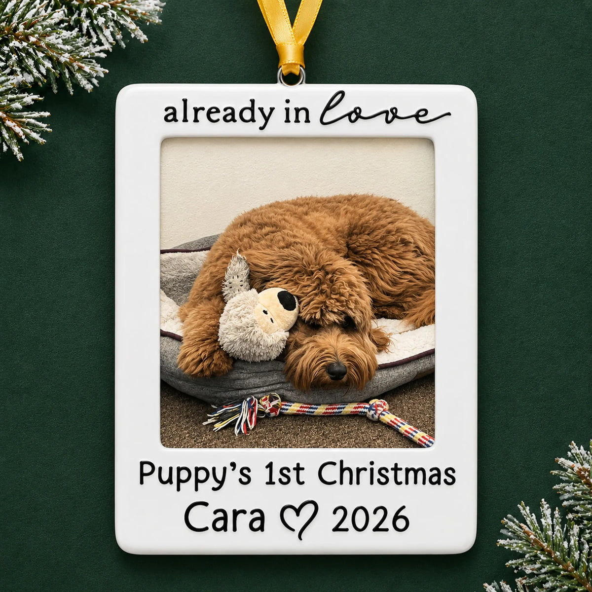 Personalized Already in Love Puppy Photo Frame christmas ornament on a dark green pine background
