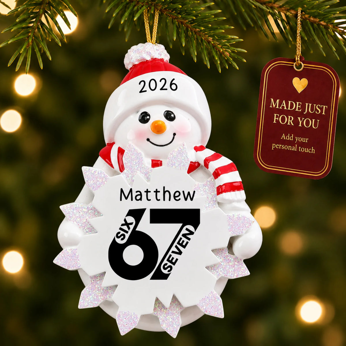 6 7 viral slang christmas ornament hanging on a lit Christmas tree with a Made Just For You gift tag