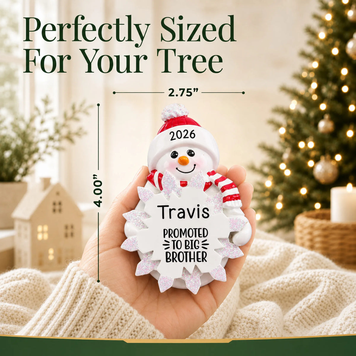 Size guide: the personalized promoted to big brother christmas ornament shown in hand next to a Christmas tree