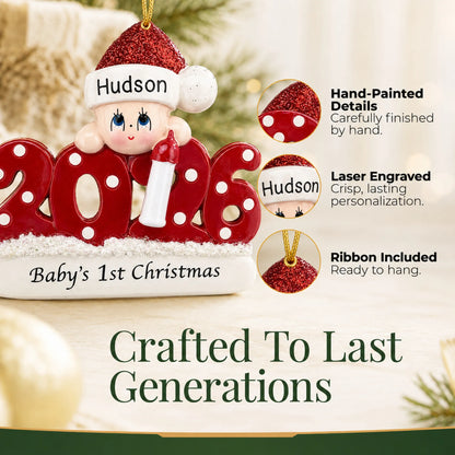 Hand-painted details and laser engraved personalization on the baby's 1st christmas 2026 ornament, ribbon included