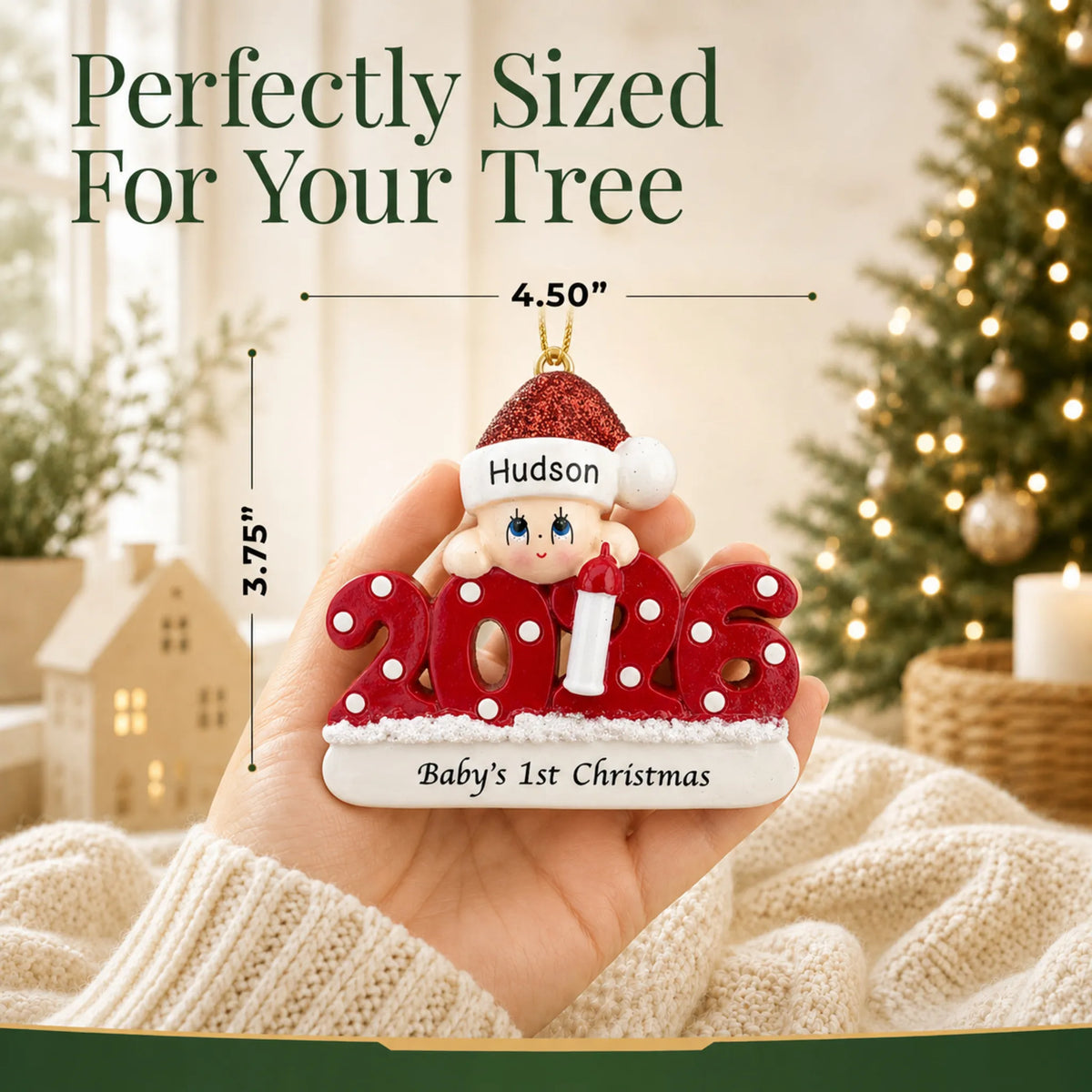 Size guide: the personalized baby's 1st christmas 2026 ornament is 4.50 in wide by 3.75 in tall, shown in hand