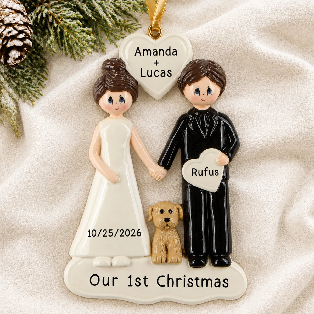 Personalized Wedding Couple With Dog christmas ornament laid on a soft white knit blanket