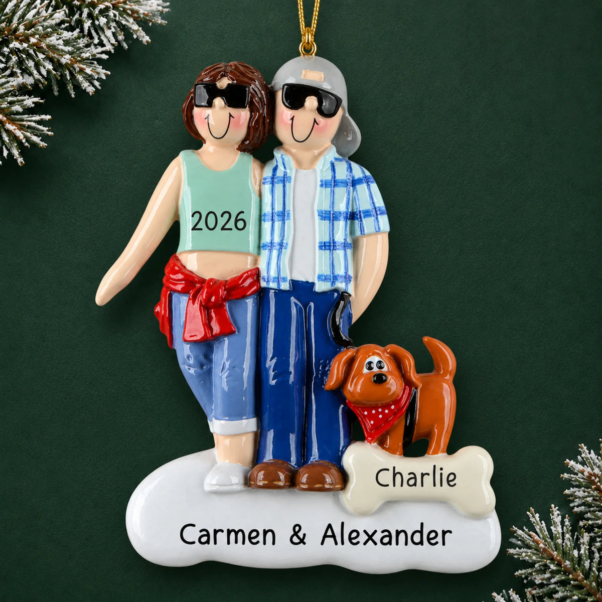 Personalized cool couple with brown dog christmas ornament on a dark green pine background