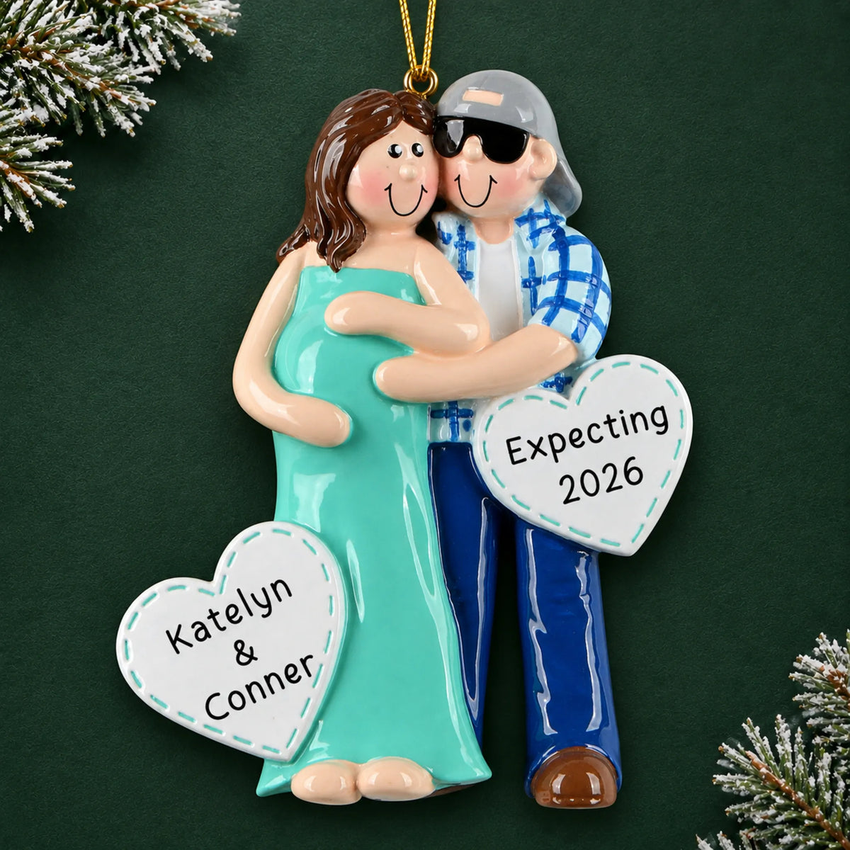 Personalized Expecting Couple christmas ornament on a dark green pine background