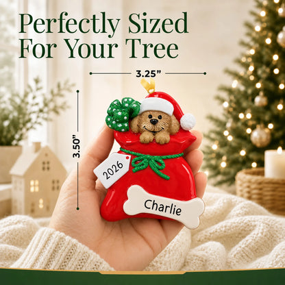 Size guide: the personalized Puppy Dog christmas ornament is 3.25 in wide by 3.50 in tall, shown in hand