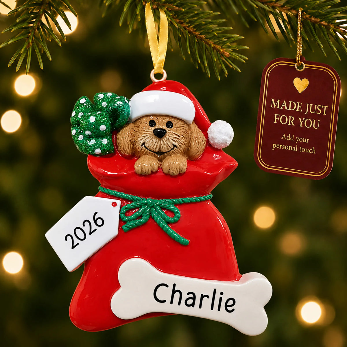 Puppy Dog christmas ornament hanging on a lit Christmas tree with a Made Just For You gift tag
