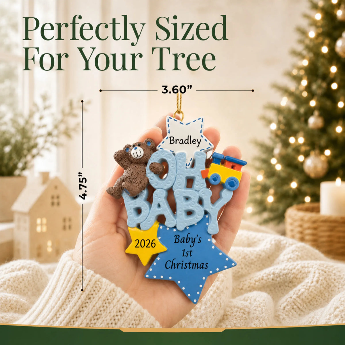 Size guide: the personalized oh baby boy 1st christmas ornament is 3.60 in wide by 4.75 in tall, shown in hand