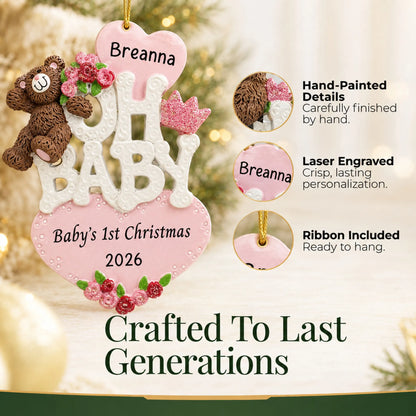 Hand-painted details and laser engraved personalization on the oh baby girl 1st christmas ornament, ribbon included