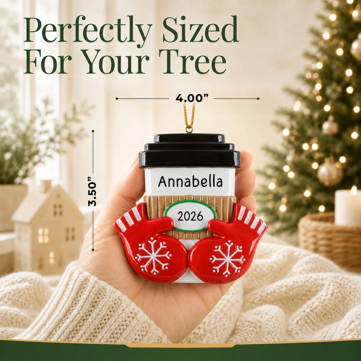 Size guide: the personalized Coffee / Hot Cocoa Cup christmas ornament is 4.00 in wide by 3.50 in tall, shown in hand