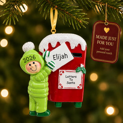 Letters to santa christmas ornament hanging on a lit Christmas tree with a Made Just For You gift tag