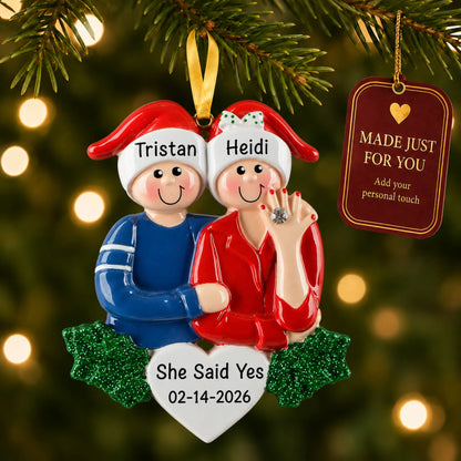 Engaged Couple christmas ornament hanging on a lit Christmas tree with a Made Just For You gift tag