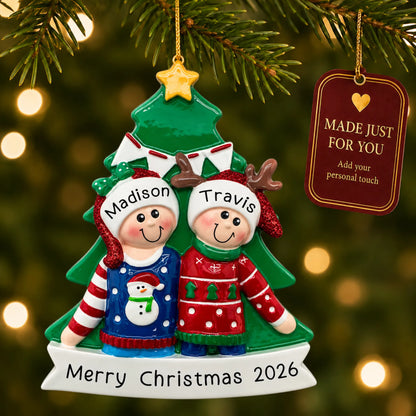 Ugly sweater holiday couple christmas ornament hanging on a lit Christmas tree with a Made Just For You gift tag