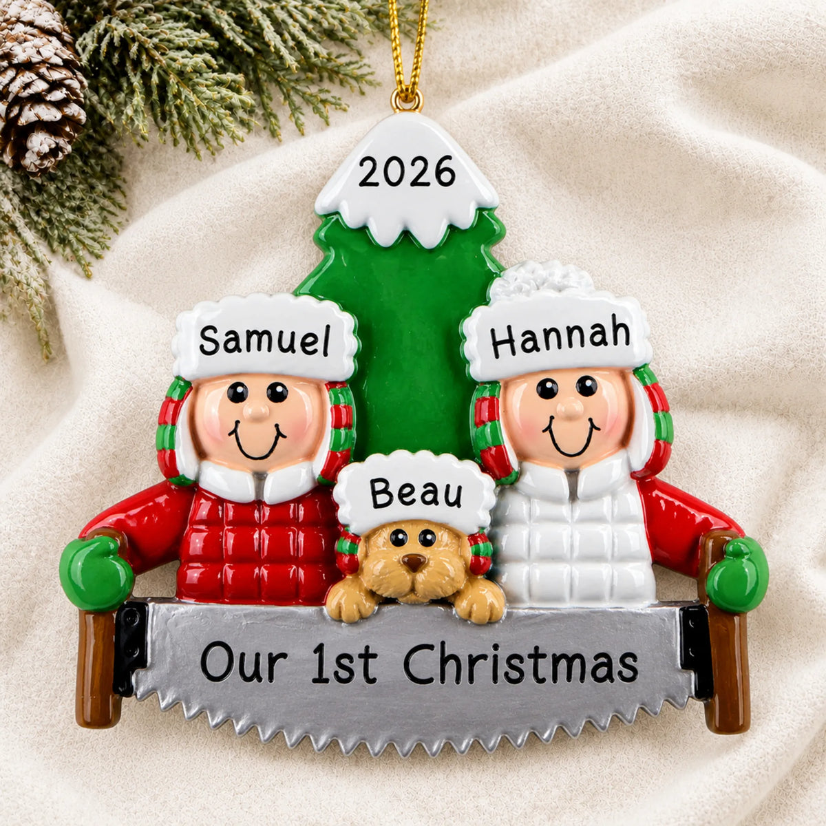 Personalized outdoor couple with dog christmas ornament laid on a soft white knit blanket