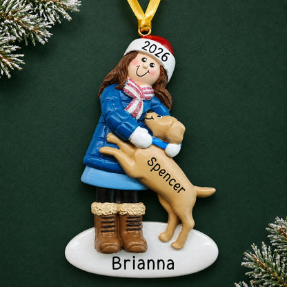 Personalized Girl With Brown Dog christmas ornament on a dark green pine background