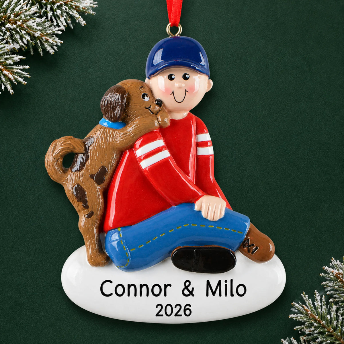 Personalized Boy With Puppy christmas ornament on a dark green pine background