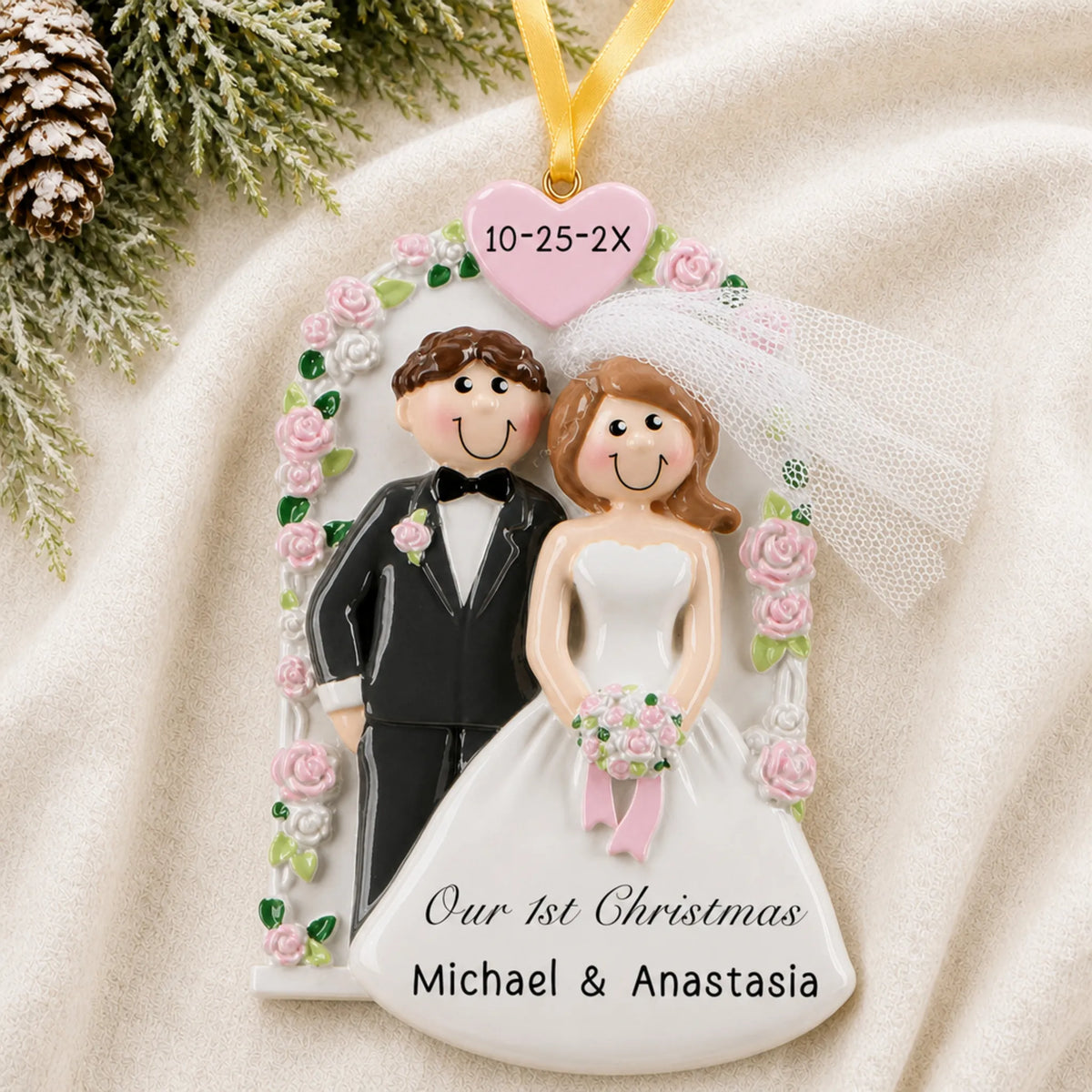 Personalized Wedding Arch Just Married christmas ornament laid on a soft white knit blanket