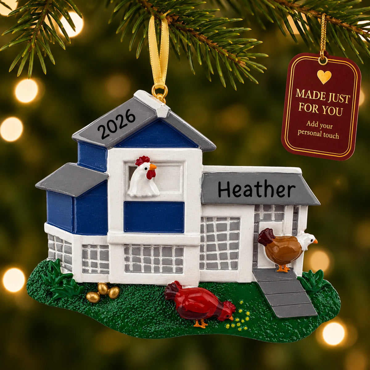 Chicken coop christmas ornament hanging on a lit Christmas tree with a Made Just For You gift tag