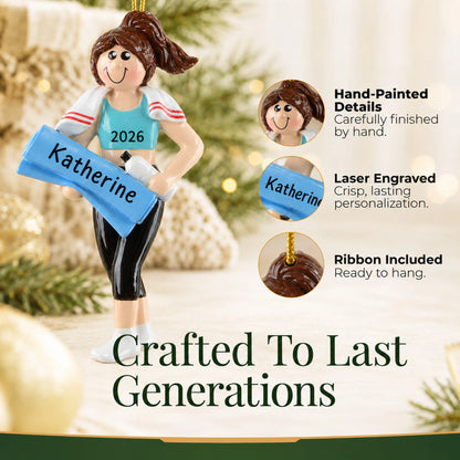 Hand-painted details and laser engraved personalization on the yoga girl christmas ornament, ribbon included