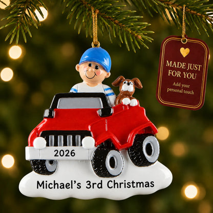 Boys ride on electric car christmas ornament hanging on a lit Christmas tree with a Made Just For You gift tag
