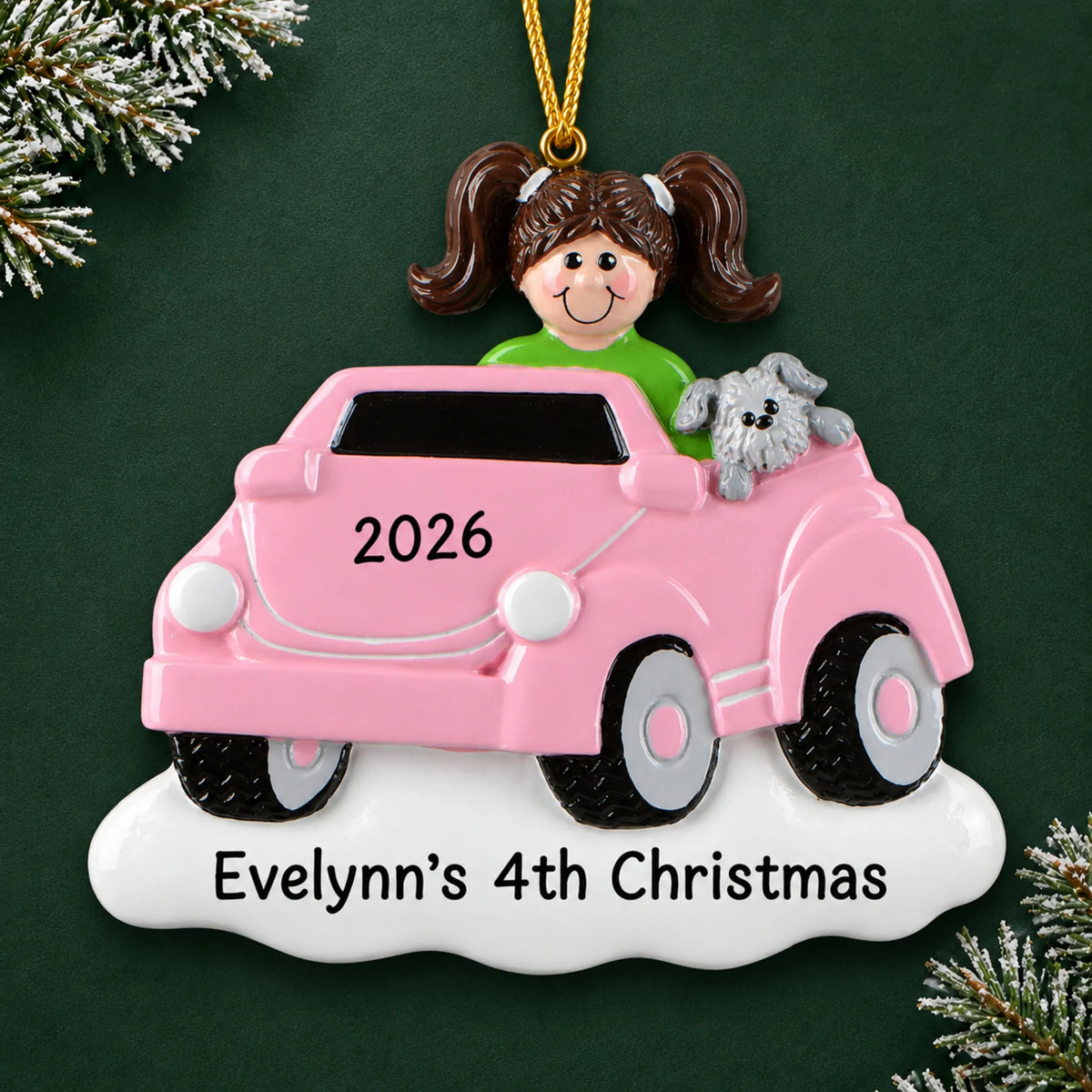 Personalized girls ride on electric car christmas ornament on a dark green pine background