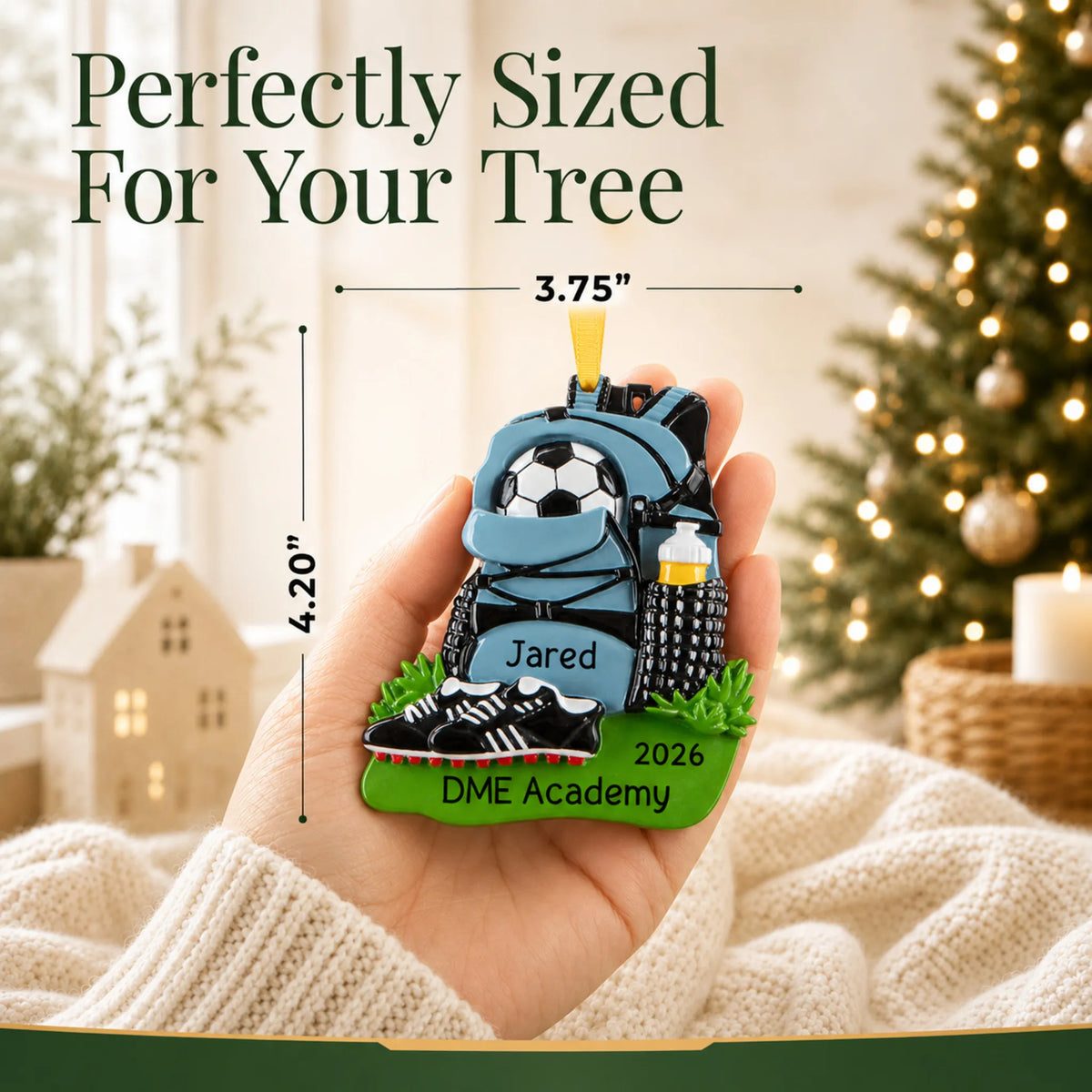 Size guide: the personalized soccer gear christmas ornament is 3.75 in wide by 4.20 in tall, shown in hand