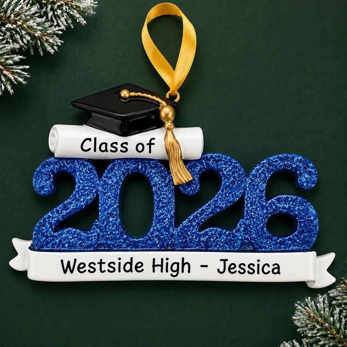 Personalized Class of 2026 graduation Christmas ornament in blue glitter with grad cap, diploma and school name banner