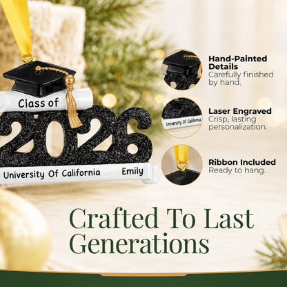 Close-up of the Class of 2026 black graduation ornament's hand-painted details, laser-engraved banner and hanging ribbon