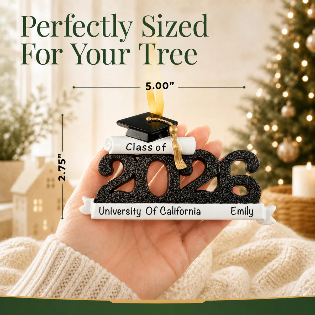 Personalized Class of 2026 black graduation Christmas ornament held in hand, about 5 by 2.75 inches for the tree
