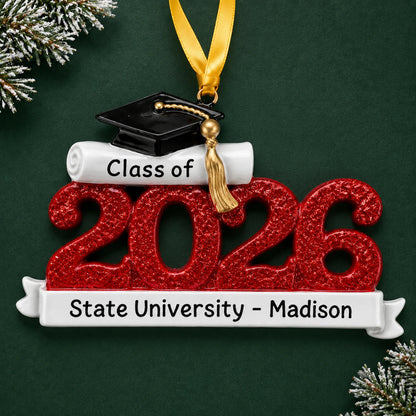 Personalized Class of 2026 graduation Christmas ornament in red glitter with grad cap, diploma and school name banner