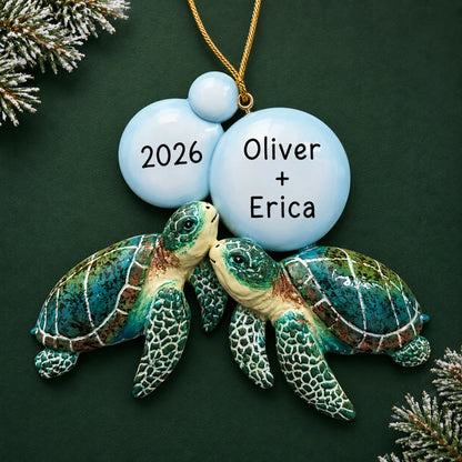 Personalized sea turtle couple christmas ornament on a dark green pine background