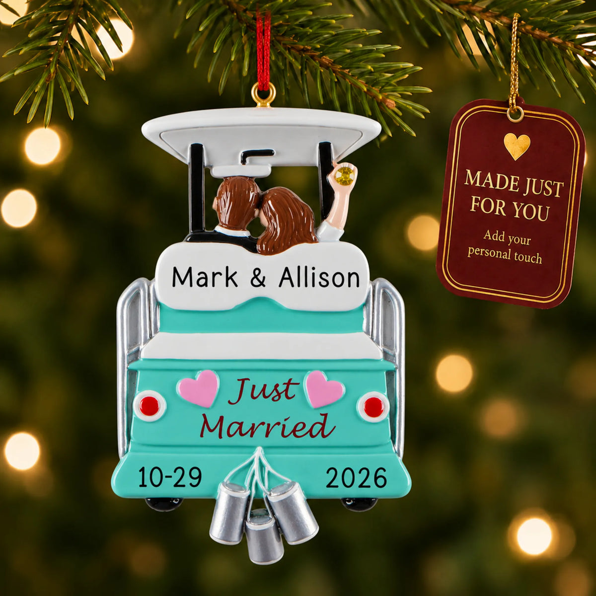 Just Married Wedding christmas ornament hanging on a lit Christmas tree with a Made Just For You gift tag