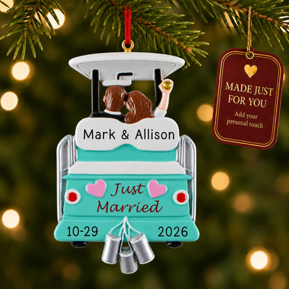 Just Married Wedding christmas ornament hanging on a lit Christmas tree with a Made Just For You gift tag