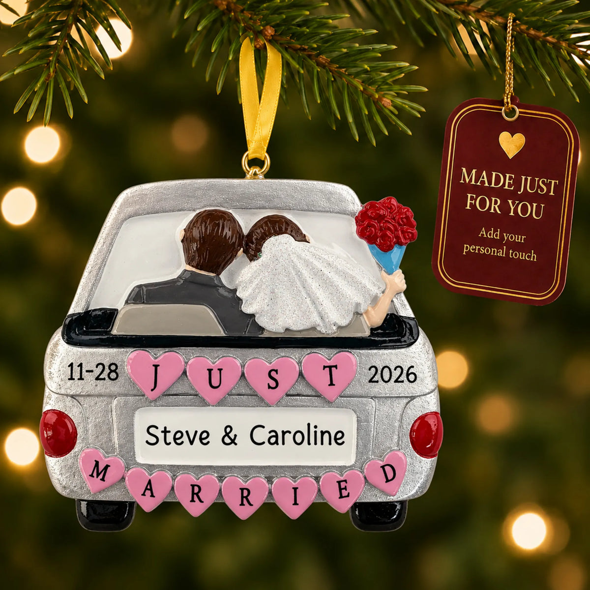 Just Married Car Silver christmas ornament hanging on a lit Christmas tree with a Made Just For You gift tag
