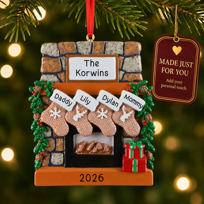 Rustic fireplace family of 4 christmas ornament hanging on a lit Christmas tree with a Made Just For You gift tag