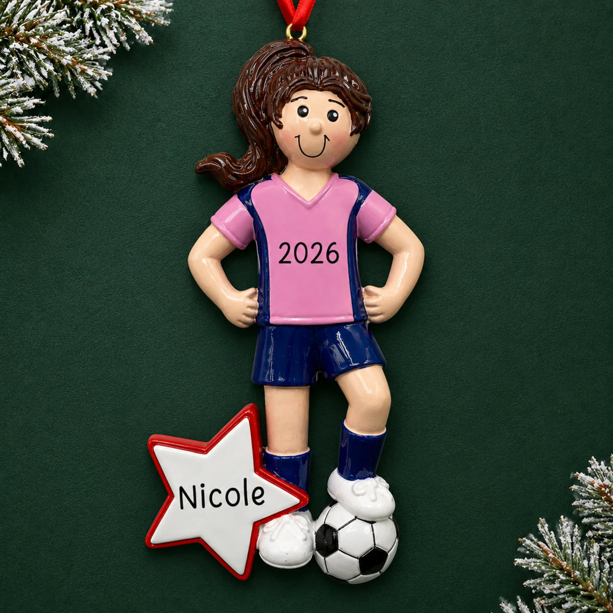 Personalized soccer all-star girl christmas ornament on a dark green pine background