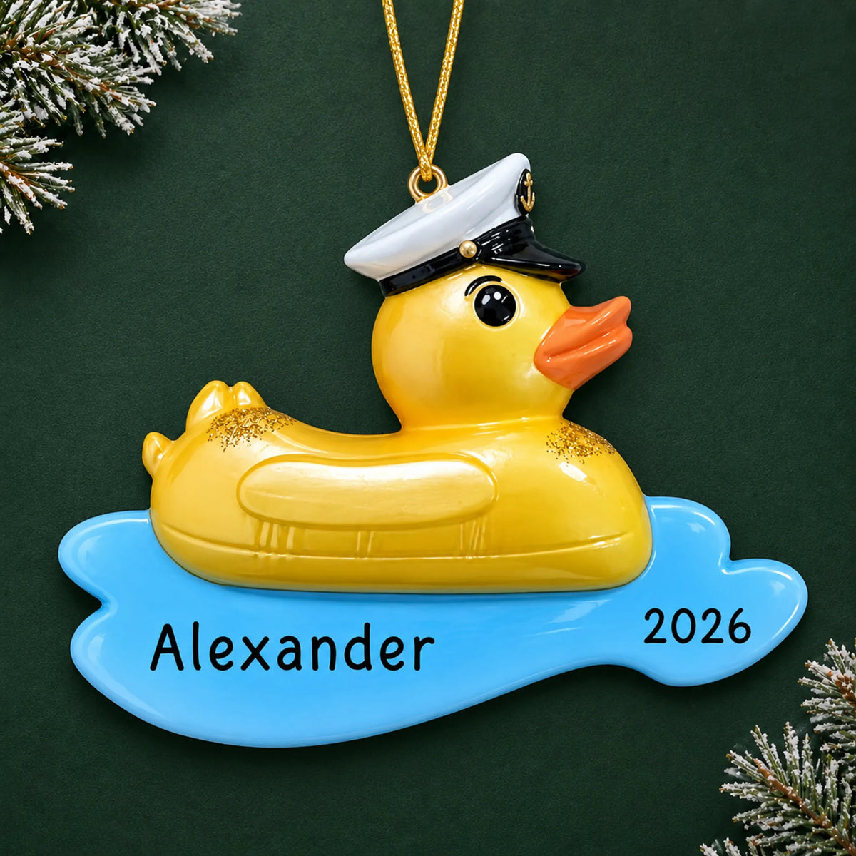 Personalized rubber ducky floatie christmas ornament on a dark green pine background