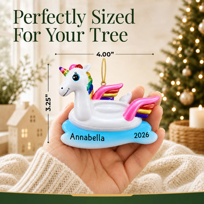 Size guide: the personalized unicorn floatie christmas ornament is 4.00 in wide by 3.25 in tall, shown in hand