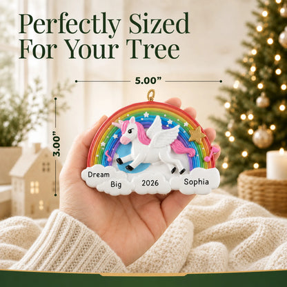 Size guide: the personalized rainbow unicorn sparkles christmas ornament is 5.00 in wide by 3.00 in tall, shown in hand