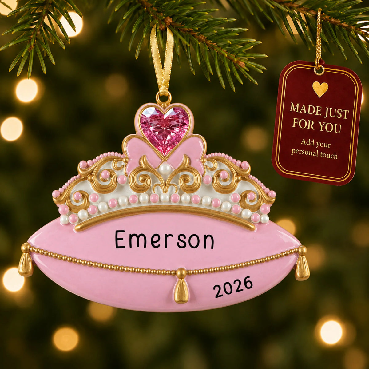 Princess tiara christmas ornament hanging on a lit Christmas tree with a Made Just For You gift tag