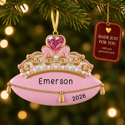 Princess tiara christmas ornament hanging on a lit Christmas tree with a Made Just For You gift tag