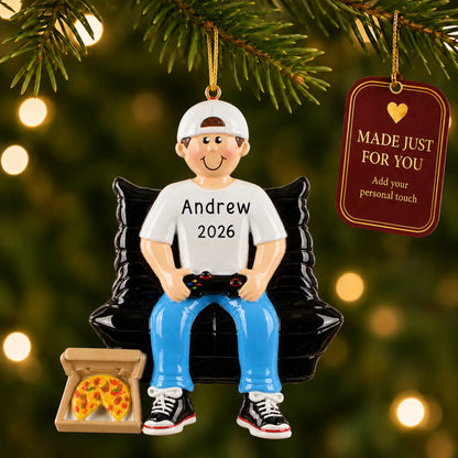 Gamer boy christmas ornament hanging on a lit Christmas tree with a Made Just For You gift tag