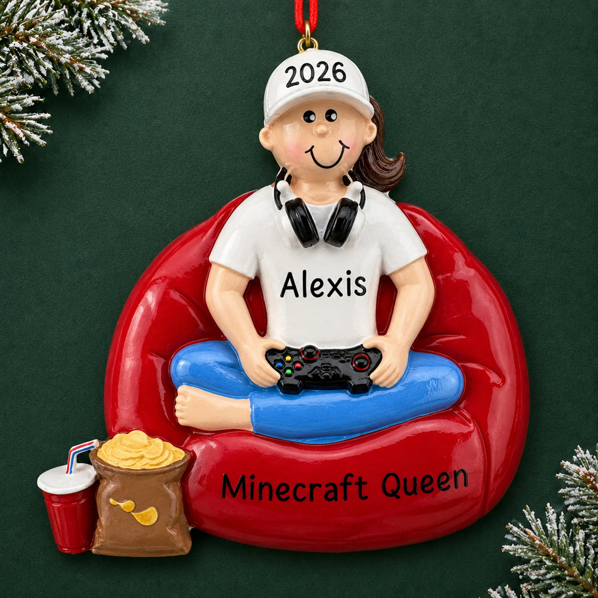 Personalized gamer girl christmas ornament on a dark green pine background