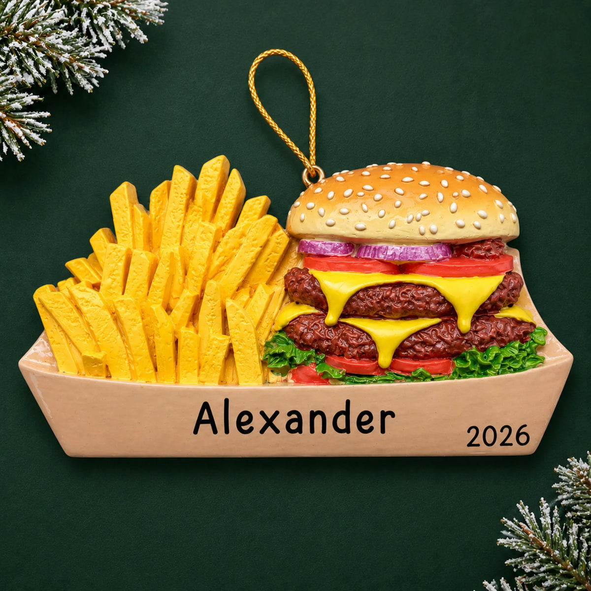 Personalized Burger & Fries christmas ornament on a dark green pine background