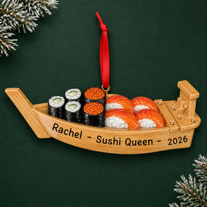 Personalized Sushi Boat christmas ornament on a dark green pine background