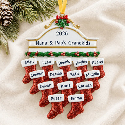 Personalized red stockings family of 14 christmas ornament laid on a soft white knit blanket