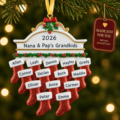 Red stockings family of 14 christmas ornament hanging on a lit Christmas tree with a Made Just For You gift tag