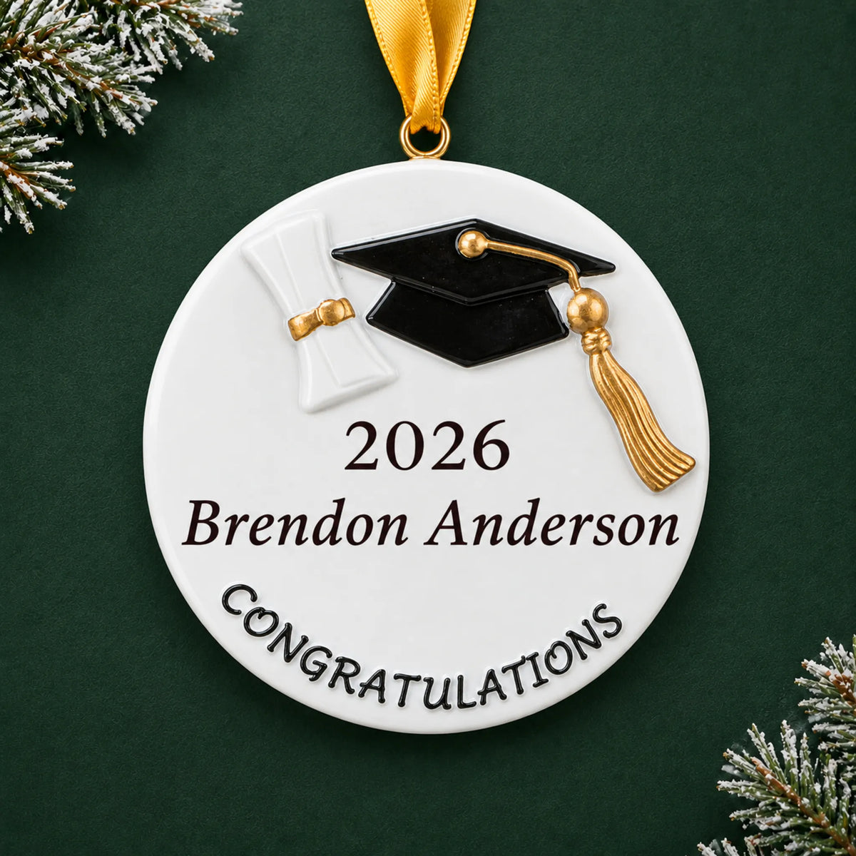 Personalized graduation class of 2026 Christmas ornament with grad cap and gold tassel on a festive green backdrop