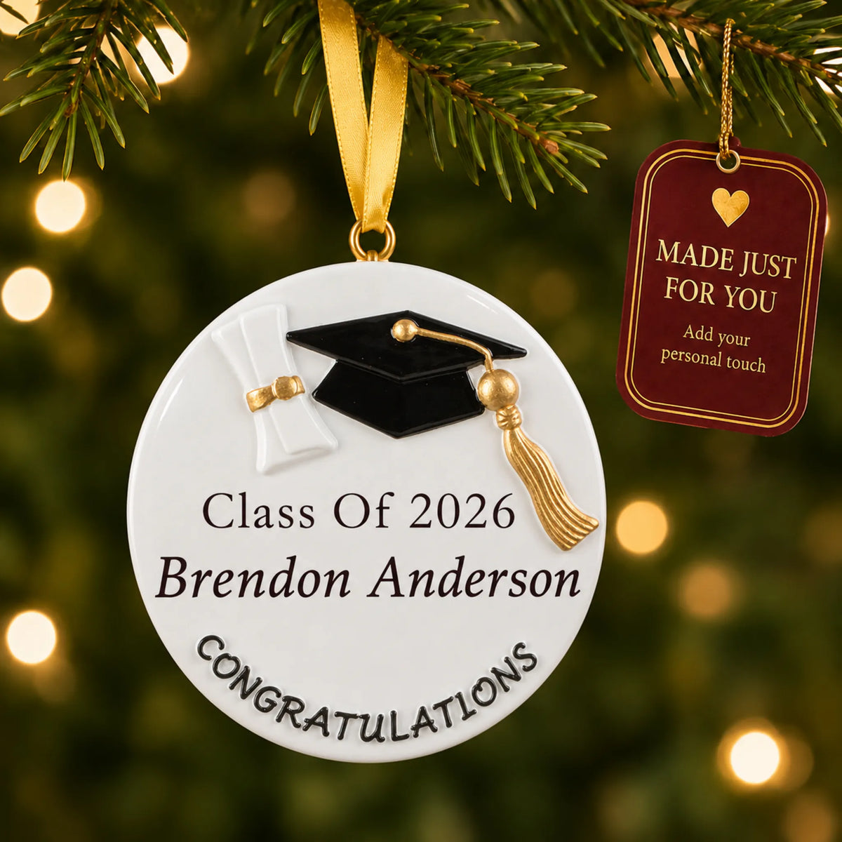 Personalized graduation class of 2026 Christmas ornament hanging on a tree with a Made Just For You gift tag